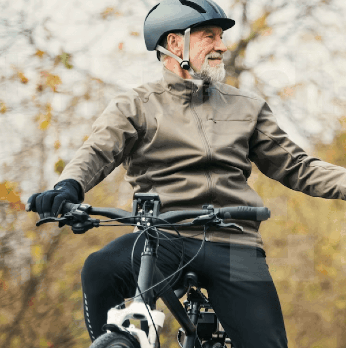 Old man on bike in woods